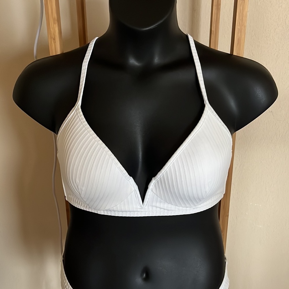 Classic White Ribbed Bikini With Plunged Neckline and High Waisted Bottoms.